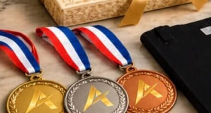 Gold, silver and bronze medals with tricolour ribbons by AXIMO